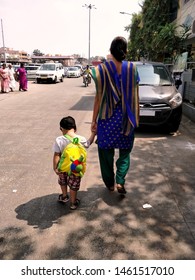 Chennai,TamilNadu/India-12022018: A Mother Taking Her Son To School By Walk