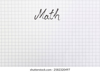 Chequered pattern empty page, mathematics copybook page , with math word hand written, abstract textured backdrop