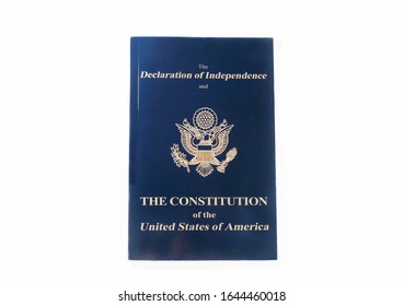 Cherkassy, Ukraine, Rudneva str. 16/2, 02.02.2020: top view of blue booklet with declaration of independence and constitution of usa isolated on white