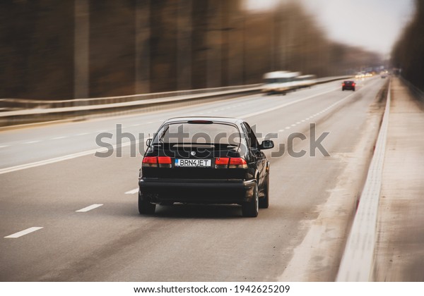 Chernigov, Ukraine - March 20, 2021:\
Old Swedish car Saab 900 Turbo on the road. Car in\
motion