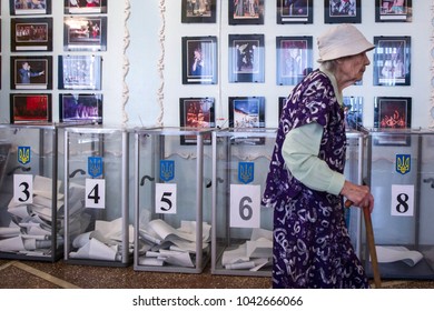 CHERNIHIV, UKRAINE - July 17, 2016: A Woman Votes At A Polling Station During Local Elections In Chernihiv, Ukraine.