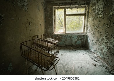 Chernobyl, Ukraine - Aug 07, 2019: Cribs At The Nursery Of Pripyat Hospital - Pripyat, Chernobyl Exclusion Zone, Ukraine