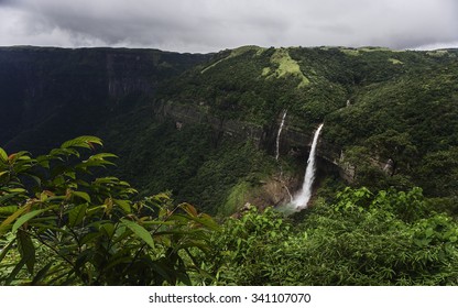 Cherrapunji, Meghalaya, India. Nohkalikai waterfall surrounded by high cliffs and woodland and thick vegetation near Cherrapunji, Meghalaya, India.