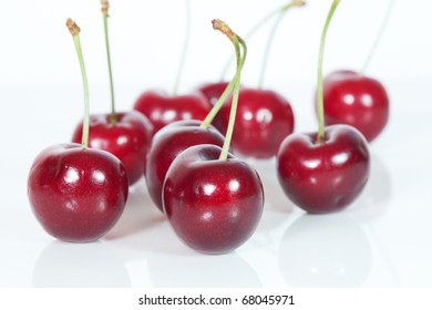 Cherries on white background