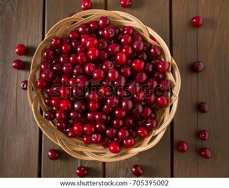 cherries on wooden surface