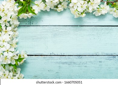 cherry blossom on old blue painted wooden, frame background - Shutterstock ID 1660705051
