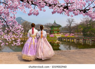 Cherry Blossom in spring with Korean national dress at Gyeongbokgung Palace  Seoul,South Korea.