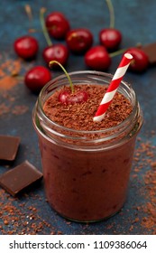 Cherry Chocolate Smoothie (black Forest) In A Jar On A Dark Blue Background