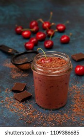 Cherry Chocolate Smoothie (black Forest) In A Jar On A Dark Blue Background