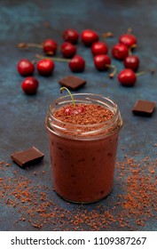 Cherry Chocolate Smoothie (black Forest) In A Jar On A Dark Blue Background