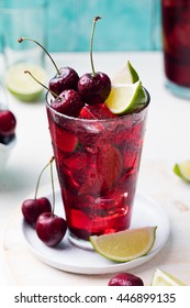 Cherry Cola, Limeade, Lemonade, Cocktail In A Tall Glass On A White Background