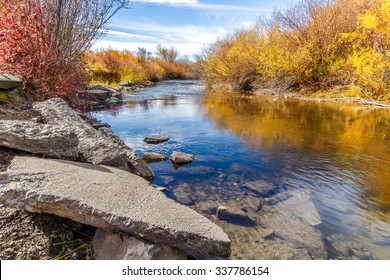 Cherry Creek running through the beautiful autumn landscape of Cherry Creek Nature Preserve on the outskirts of Bozeman, Montana