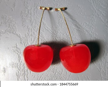 Cherry Earrings On Gray Background