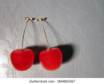 Cherry Earrings On Gray Background