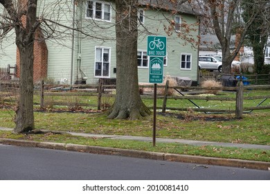 Cherry Hill, New Jersey - December, 2020: Bike Route Sign On A Grassy Strip Near A Neighborhood Street