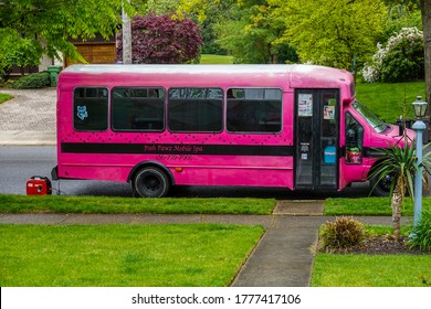 Cherry Hill, New Jersey - July, 2020: A Pink School Bus Used As A Dog Grooming Spa Parked On A Street In Front Of A House