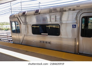 Cherry Hill, New Jersey - October, 2022: The Front Car Of A Silver Subway Train At An Outdoor Station