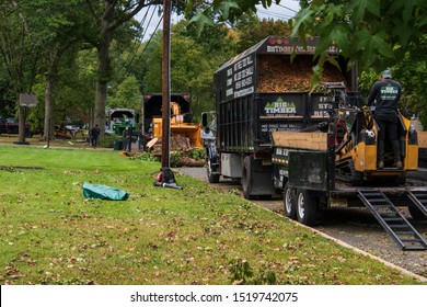 Cherry Hill, New Jersey - September 30, 2019: Tress Service Trucks Line The Streets Removing Fallen Trees After A Severe Wind Storm Passed Through This Town