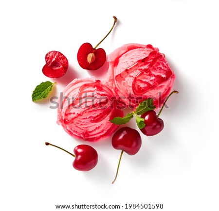 Cherry ice cream with cherry berries on white background. Pink ice cream with cherry sauce isolated for package of ice cream.