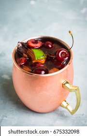 Cherry Moscow Mule On The Wooden Background. 