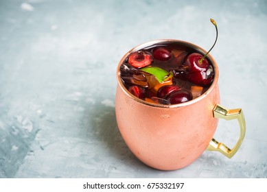 Cherry Moscow Mule On The Wooden Background. 