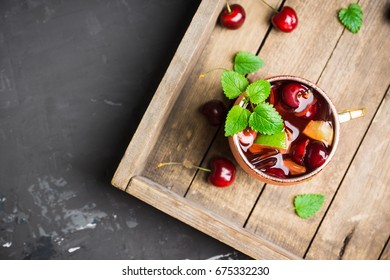 Cherry Moscow Mule On The Wooden Background.