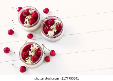 Cherry Mousse In A Glass , Beautiful  Dessert With Fresh Cherries , Whipped Creame And Chocolate Sprinkles, Empty Space For Text