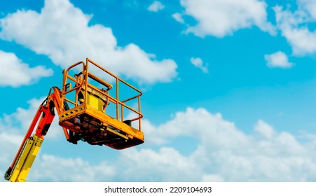 Cherry Picker With Blue Sky