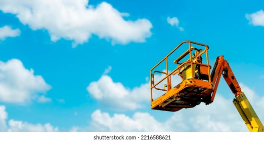 Cherry Picker With Blue Sky