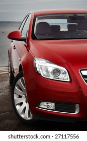 Cherry Red Car Front Bumper, Light And Wheel Detail