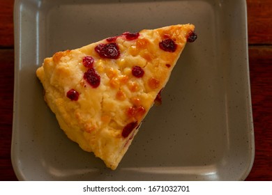 Cherry Scone, In Grey Plate On Wood Table.