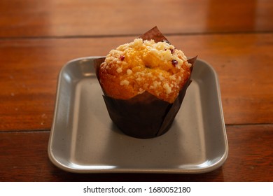 Cherry Scone, In Grey Plate On Wood Table.