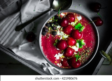 Cherry Smoothie Bowl On Rustic Wooden Background