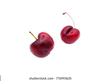 Cherry with stem on a white background.