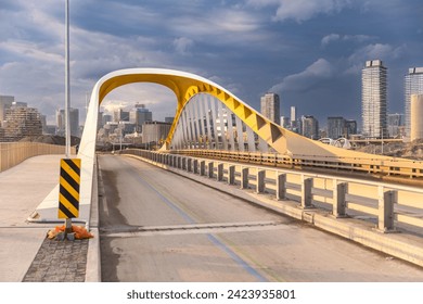 Cherry Street South Bridge with the Toronto skyline at sunset in the background - Powered by Shutterstock