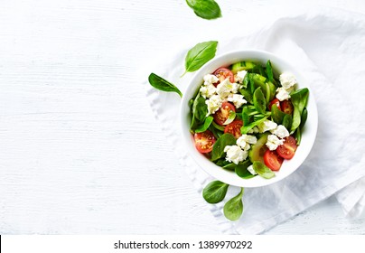 Cherry tomato, corn lettuce and cucumber salad with feta. Copy space. Flat lay - Powered by Shutterstock