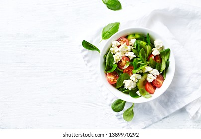 Cherry Tomato, Corn Lettuce And Cucumber Salad With Feta. Copy Space. Flat Lay