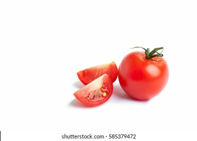 Cherry Tomato In A Cut Isolated On A White Background. The Concept Of Healthy Nutrition, Organic Food, Fresh Vegetables, Veganism