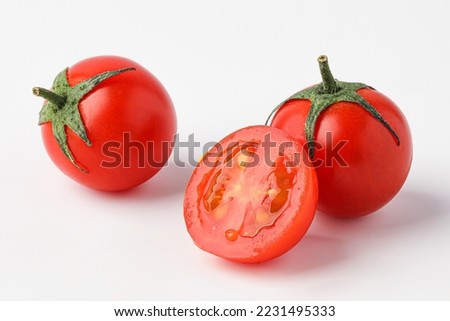 cherry tomato, mini tomato, small tomato, baby tomato isolated on white background