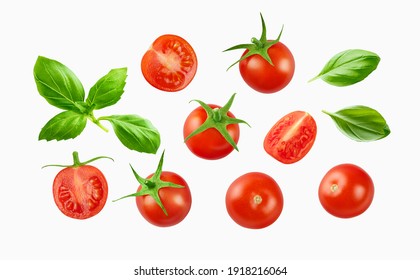 Cherry tomatoes with basil leaves  isolated on white - Shutterstock ID 1918216064