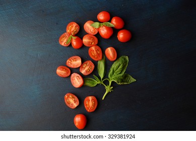 Cherry Tomatoes With Basil. Top View, Copy Space