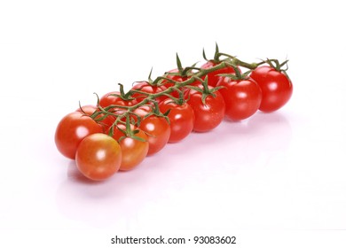Cherry tomatoes on white background