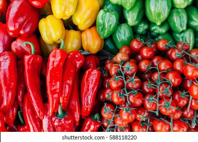 Cherry Tomatoes And Peppers Beautifully Situated On A Farmer's Market