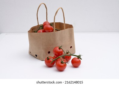 Cherry Tomatoes In A Small Brown Paper Bag