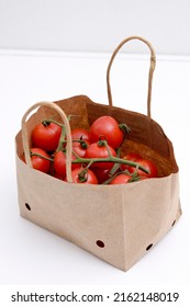 Cherry Tomatoes In A Small Brown Paper Bag