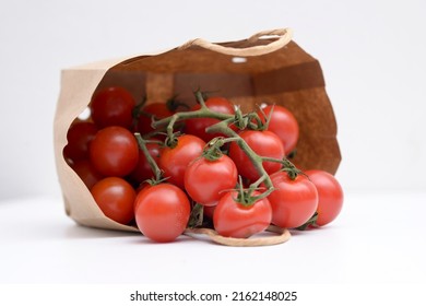 Cherry Tomatoes In A Small Brown Paper Bag