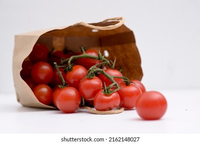 Cherry Tomatoes In A Small Brown Paper Bag