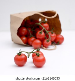 Cherry Tomatoes In A Small Brown Paper Bag