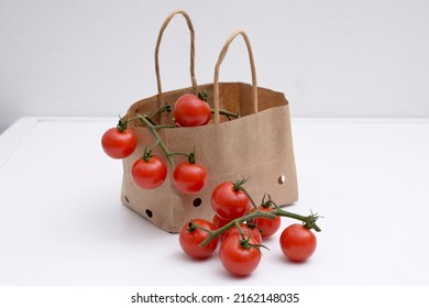 Cherry Tomatoes In A Small Brown Paper Bag