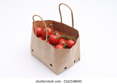 Cherry Tomatoes In A Small Brown Paper Bag